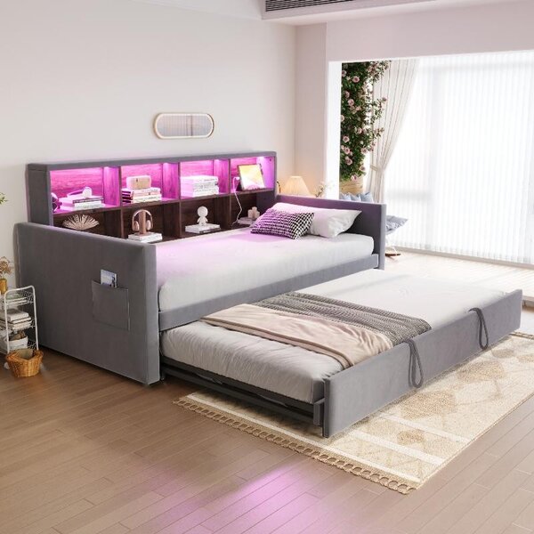 Letto imbottito 90x190 cm, divano letto con meccanismo estraibile, rivestito in velluto color grigio scuro, con testiera contenitore, illuminazione LED e prese di corrente