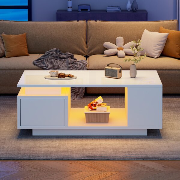 Tavolino da salotto, dimensioni 100 x 50 x 36 cm, realizzato in pannello di particelle di legno al 100%, colore bianco, dotato di 1 cassetto, 4 vani portaoggetti laterali e illuminazione a LED