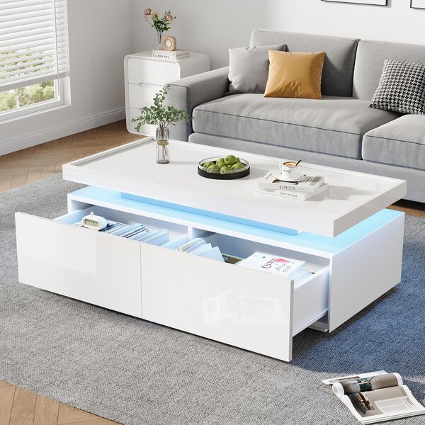 Tavolino da divano di 95 x 45 x 35 cm, realizzato in pannello di particelle rivestito in bianco con illuminazione a LED, dotato di 2 cassetti e un vano portaoggetti semiaperto, con finitura lucida