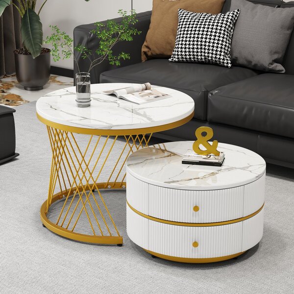 Tavolino da salotto componibile, composto da due elementi: uno di dimensioni 60x60x46 cm e uno di 50x50x30,8 cm. Realizzato in MDF al 100%, con finitura bianca e forma rotonda a nido d'ape, dotato di 2 cassetti