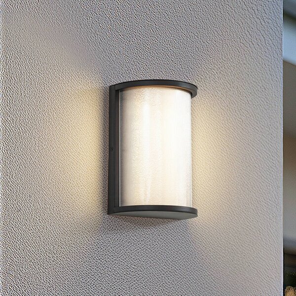 Lindby Applique da esterni LED Calvik, nera, scanalata, IP44 Calvik, Nero, Acciaio Inox, Moderno