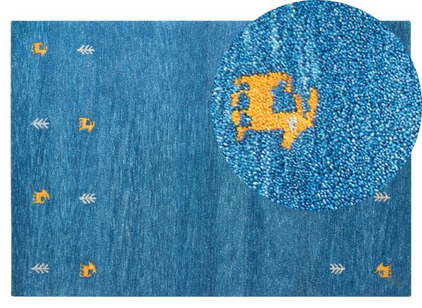 Tappeto Gabbeh in lana blu 140 x 200 cm, trapuntato a mano con motivi animali occidentali e design rustico Beliani
