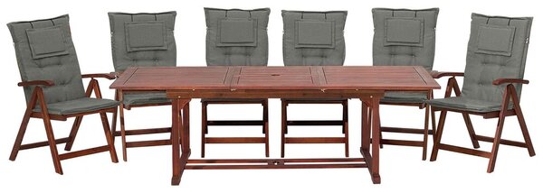 Set da pranzo da giardino Tavolo allungabile in legno di acacia chiaro 6 sedie con cuscini grigi Schienale regolabile pieghevole rustico Beliani
