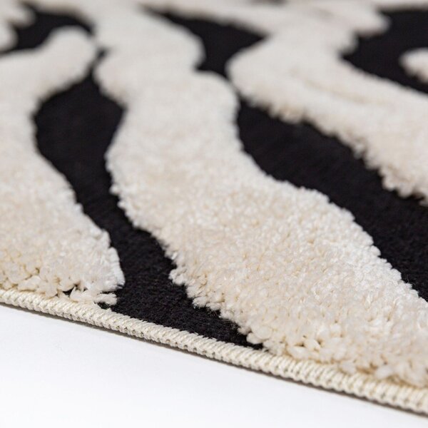 Tappeto bianco e nero 133x190 cm Esra Zebra – Flair Rugs