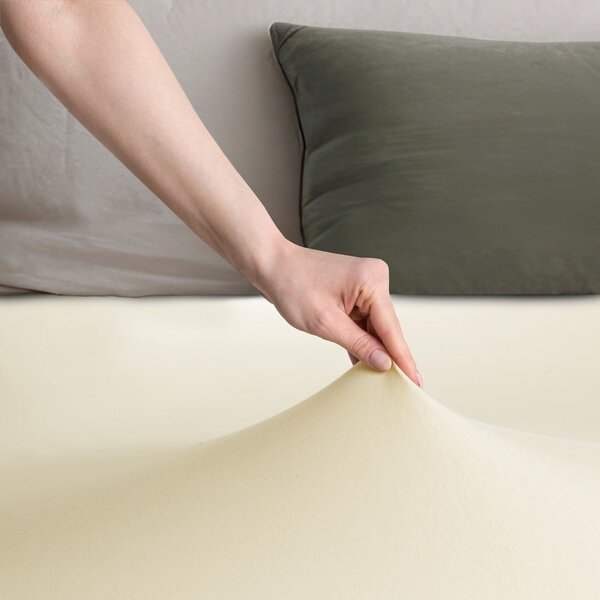 Lenzuolo con angoli color crema in jersey 140x200 cm Amber – Restilo