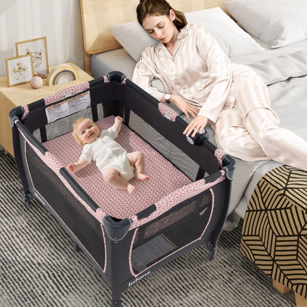 Costway Lettino pieghevole con fasciatoio materasso con cestino e borsa da trasporto, Centro attività per bambini 5 in 1 Rosa