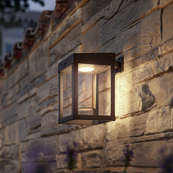 Philips Lampada da parete con sensore solare Camill nero/trasparente 14 x cm, Nero, Plastica, Moderno, Lampada solare da esterni