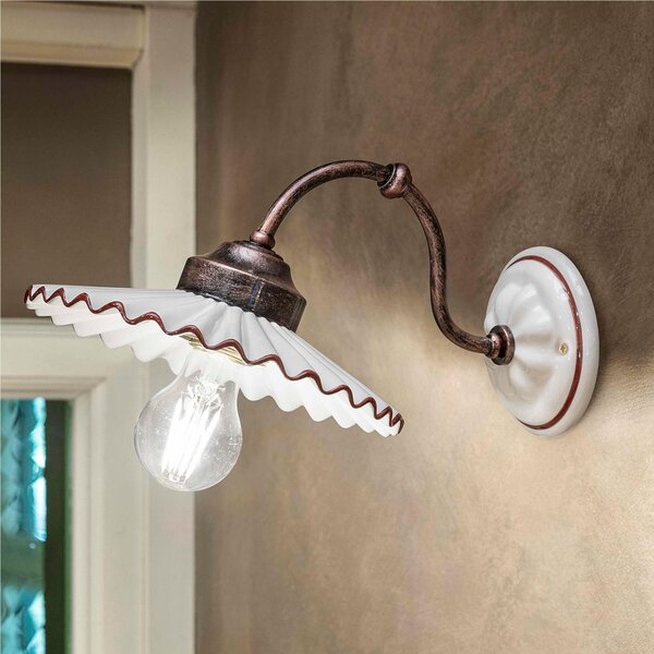Applique da parete rustica in metallo e paralume in ceramica decorata a mano L'AQUILA Dimensioni 23x31x h 18 cm peso 1,30 kg - Attacco Lampada E 27