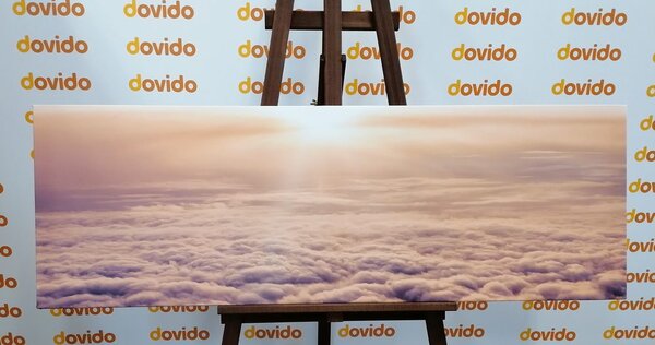 Quadro su tela – Tramonto dalla finestra dell'aereo