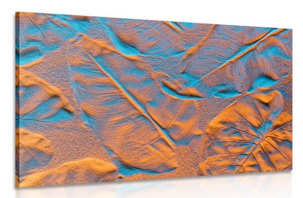 Quadro su tela – Texture di foglie sulla spiaggia di sabbia