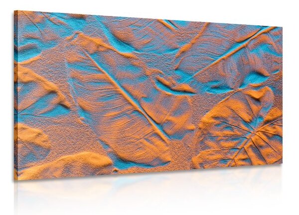 Quadro su tela – Texture di foglie sulla spiaggia di sabbia