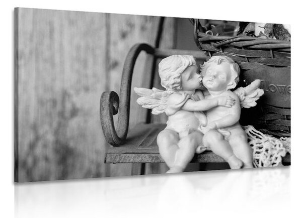 Quadro su tela – Statuette di angioletti sulla panchina in bianco e nero