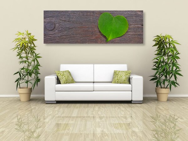 Stampa su tela – Foglia a forma di cuore su sfondo di legno