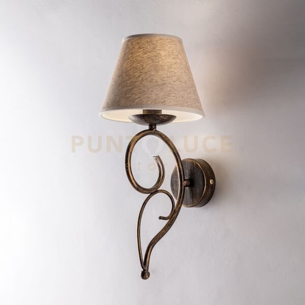 Applique in ferro laccato marrone con decorazione oro antico e para
