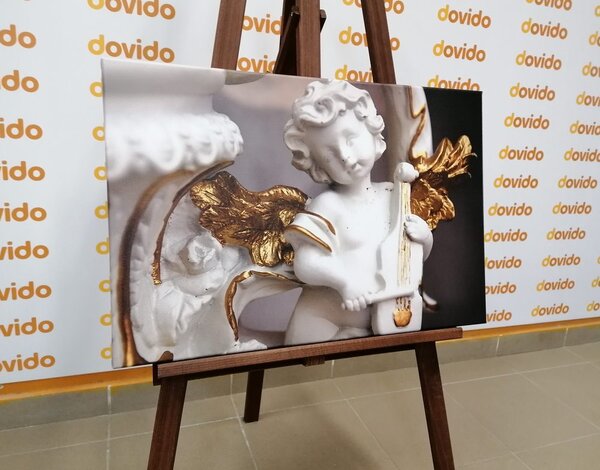 Quadro su tela – Statua di angelo che suona