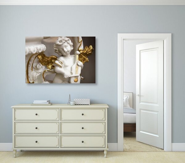 Quadro su tela – Statua di angelo che suona