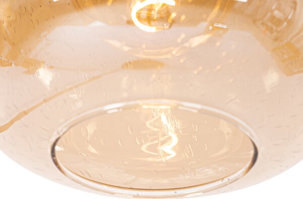 Lampada da terra di design nera con ottone e vetro ambrato - Zuzanna