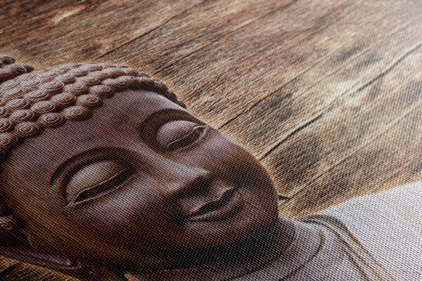 Stampa su tela – Statua del Buddha su sfondo di legno