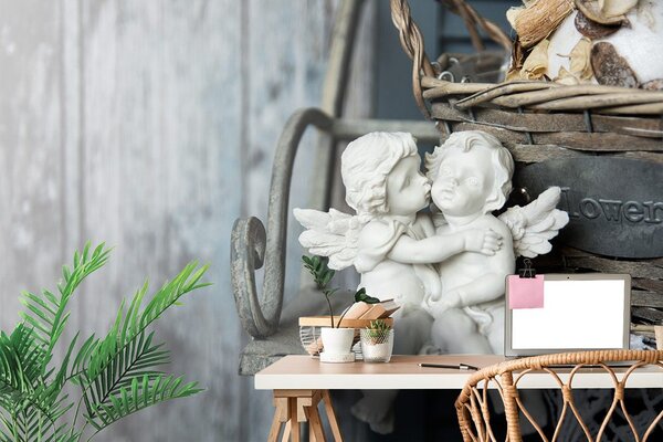 Carta da parati – Statuette di angioletti su una panchina