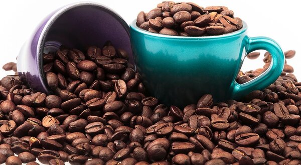 Carta da parati – Tazza con chicchi di caffè