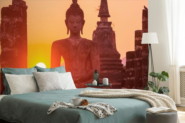 Carta da parati – Statua di Buddha tra le pietre