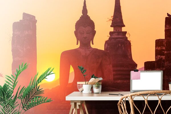 Carta da parati – Statua di Buddha tra le pietre