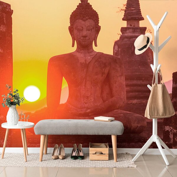 Carta da parati – Statua di Buddha tra le pietre