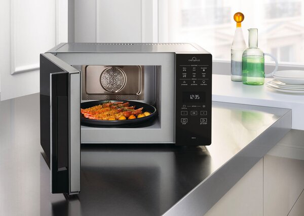 Whirlpool Forno Microonde Combinato con Grill Capacit 25 Litri Potenza 800 Watt con Funzione Vapore Jet Defrost e Crisp colore Nero - MCP 349 SL