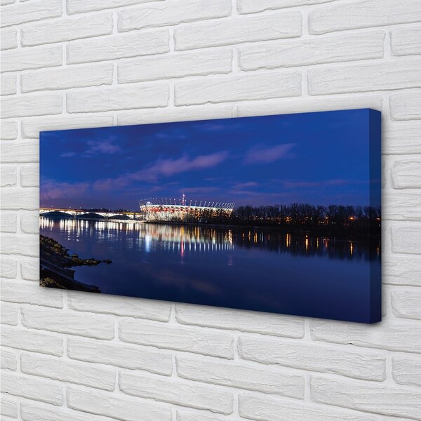 Quadro su tela Stadium notturno del ponte del fiume Varsavia 100x50 cm