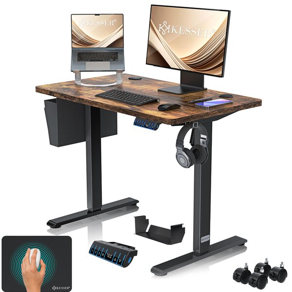 Scrivania KESSER® elettrica e regolabile in altezza, scrivania per computer ergonomica per lavorare in piedi o seduti, 3 impostazioni di memoria, rotelle a 360°, porta di ricarica USB, 100x60 cm, marrone