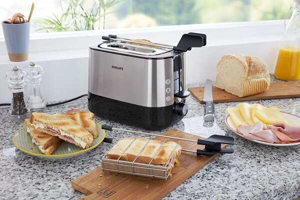 Philips Tostapane 2 Fette Potenza 650 Watt 7 Livelli di cottura Funzione scongelamento e Cassetto fondo Raccoglibriciole colore Nero/Acciaio - HD26