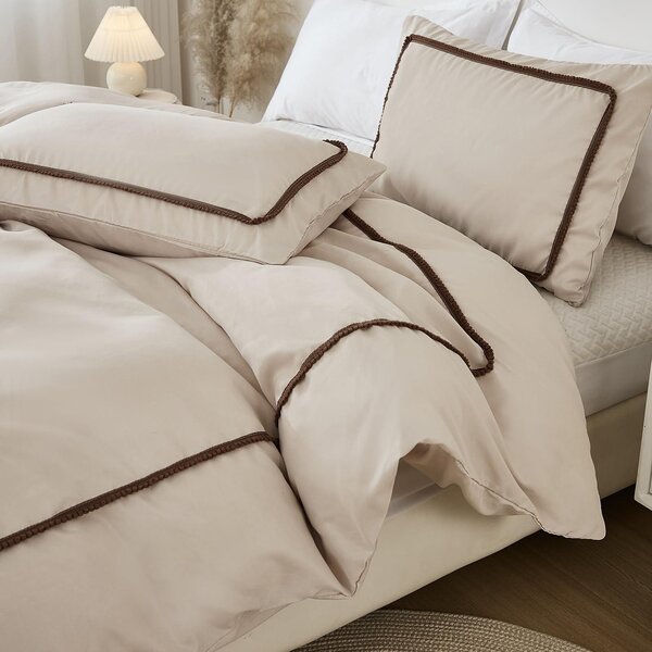 Omgoods - Set di copripiumino color taupe con decorazioni a pompon