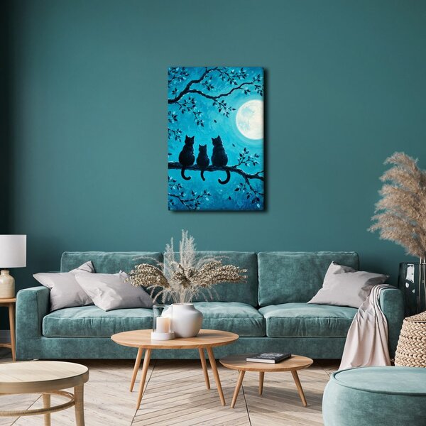 Quadro su tela – Trio di gatti sul ramo