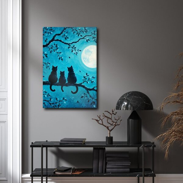 Quadro su tela – Trio di gatti sul ramo