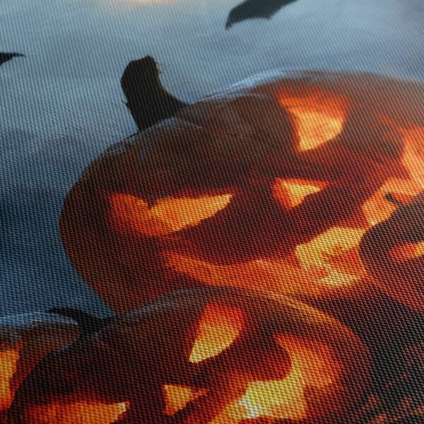 Quadro su tela – Zucche di Halloween sotto i pipistrelli