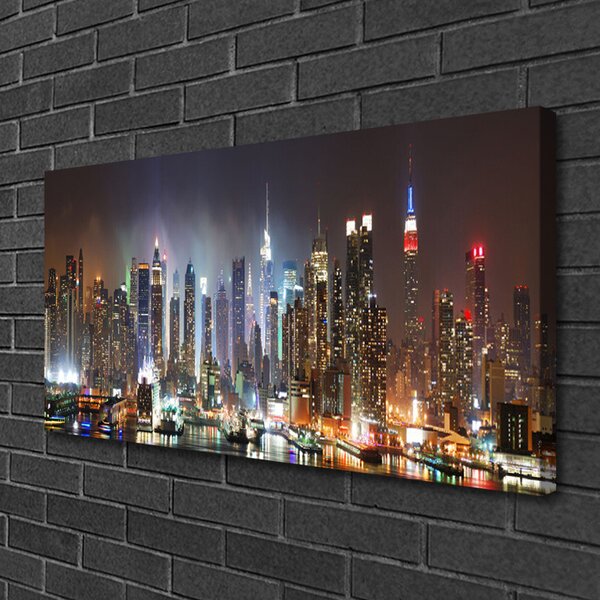 Quadro su tela Case dei grattacieli della città 100x50 cm