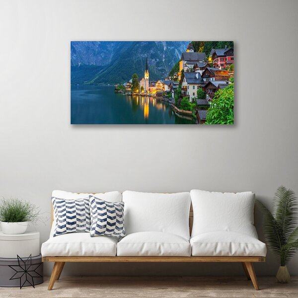 Quadro su tela Città di montagna di notte sul lago 100x50 cm