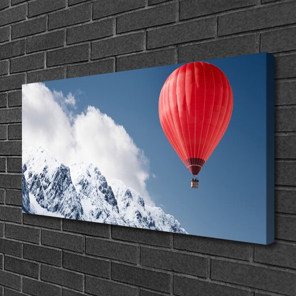 Quadro su tela Mongolfiera delle cime delle montagne invernali 100x50 cm