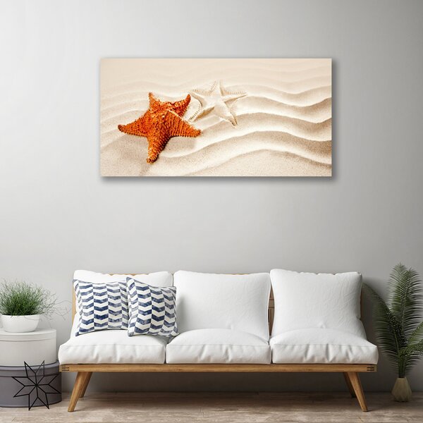 Quadro su tela Stelle marine sulla spiaggia di sabbia 100x50 cm