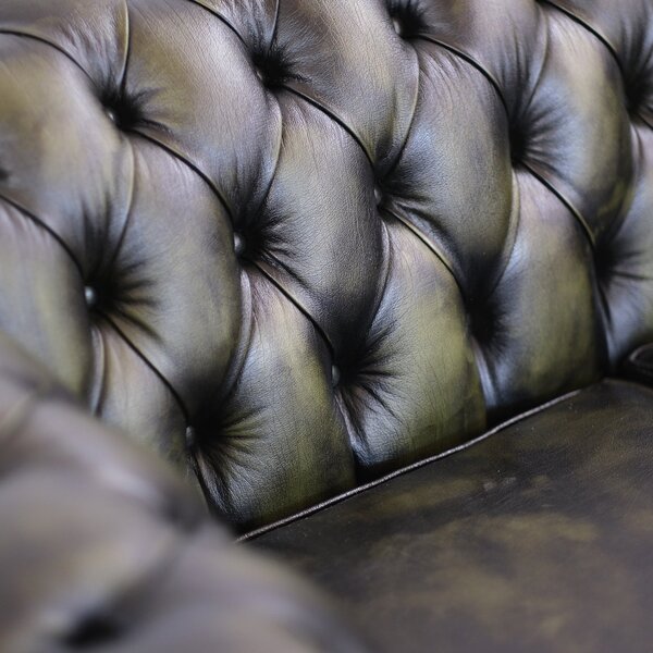 Divano Chesterfield pelle fiore verde stile old America rifinita a mano