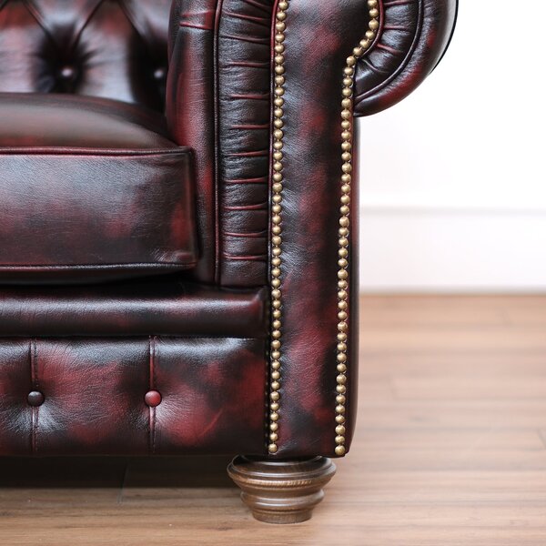 Divano Chesterfield pelle fiore bordeaux stile old America rifinita a mano