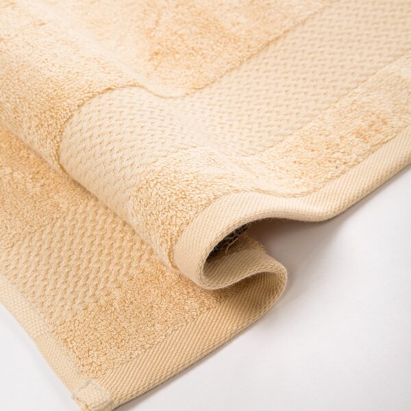 Asciugamano Con Ospite In Cotone Bamboo Standard Primanatura Tinta Unita Miele Caleffi