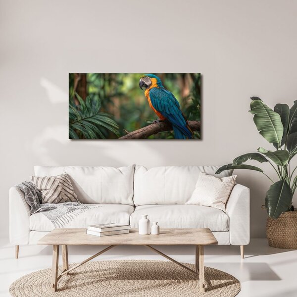 Quadro su tela – Pappagallo tra foglie tropicali