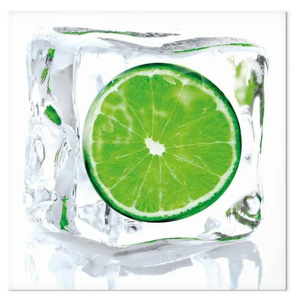 Quadro Lime congelata - natura morta raffigurante il frutto congelato nel cubetto di ghiaccio su uno sfondo bianco