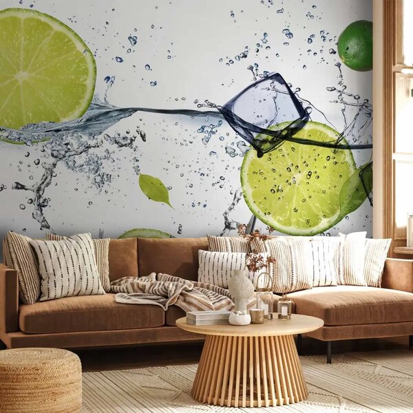 Carta da parati moderna Onda rinfrescante - lime in acqua con cubetti di ghiaccio