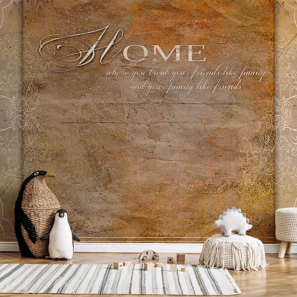 Carta da parati Home è amicizia - Citazione in inglese su sfondo arancione-beige