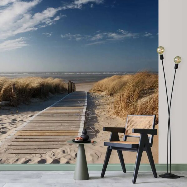 Carta da parati moderna Langeoog - spiaggia sabbiosa del Mare del Nord sotto un cielo blu