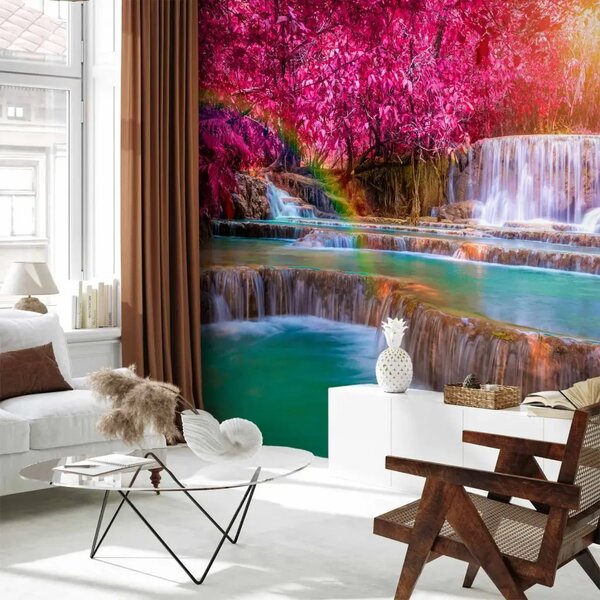 Carta da parati Cascate rosa - cascata con acqua turchese e arcobaleno tra alberi colorati