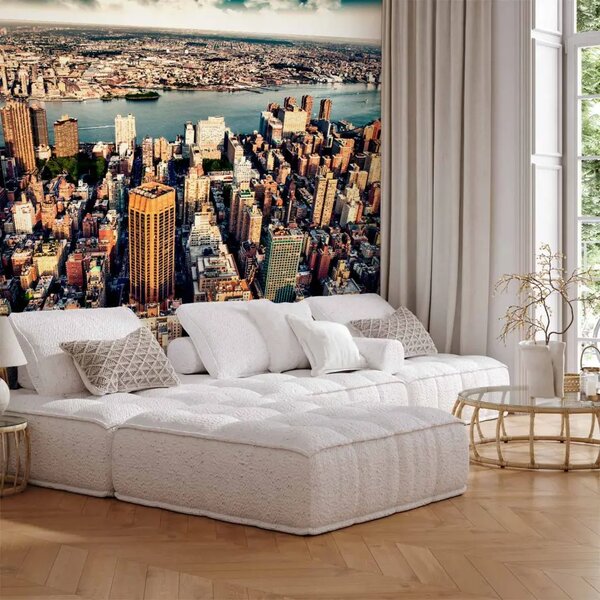 Carta da parati New York vista dall’alto - panorama urbano con grattacieli sul fiume e cielo