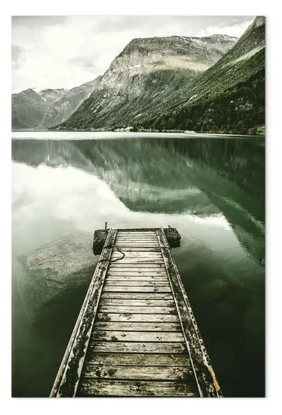 Quadro Silenzio verticale - paesaggio con un ponte di legno